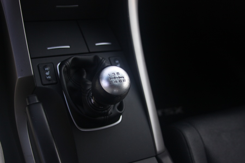 The camera hides the shift knob’s scratches and dimples.